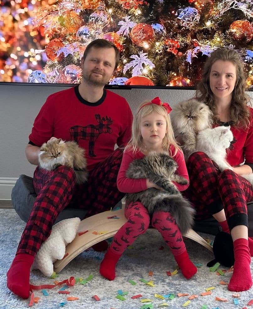 Our family with our Persian cats