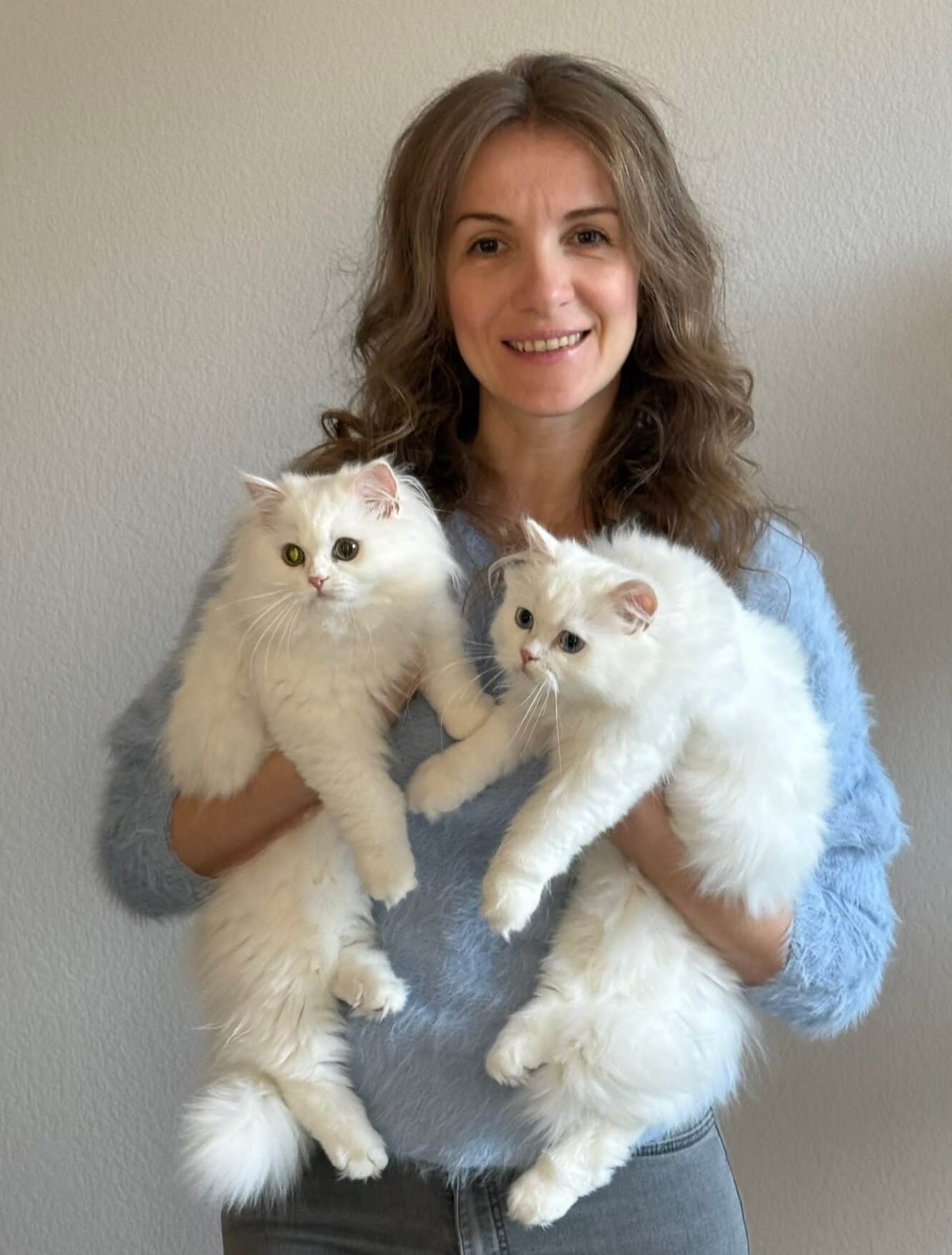 Iryna with our foundation cats